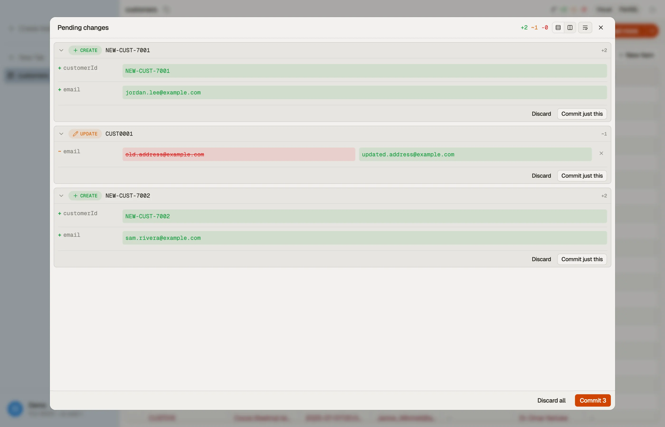 The staging panel showing pending changes as per-attribute diff cards, with per-row and bulk commit.