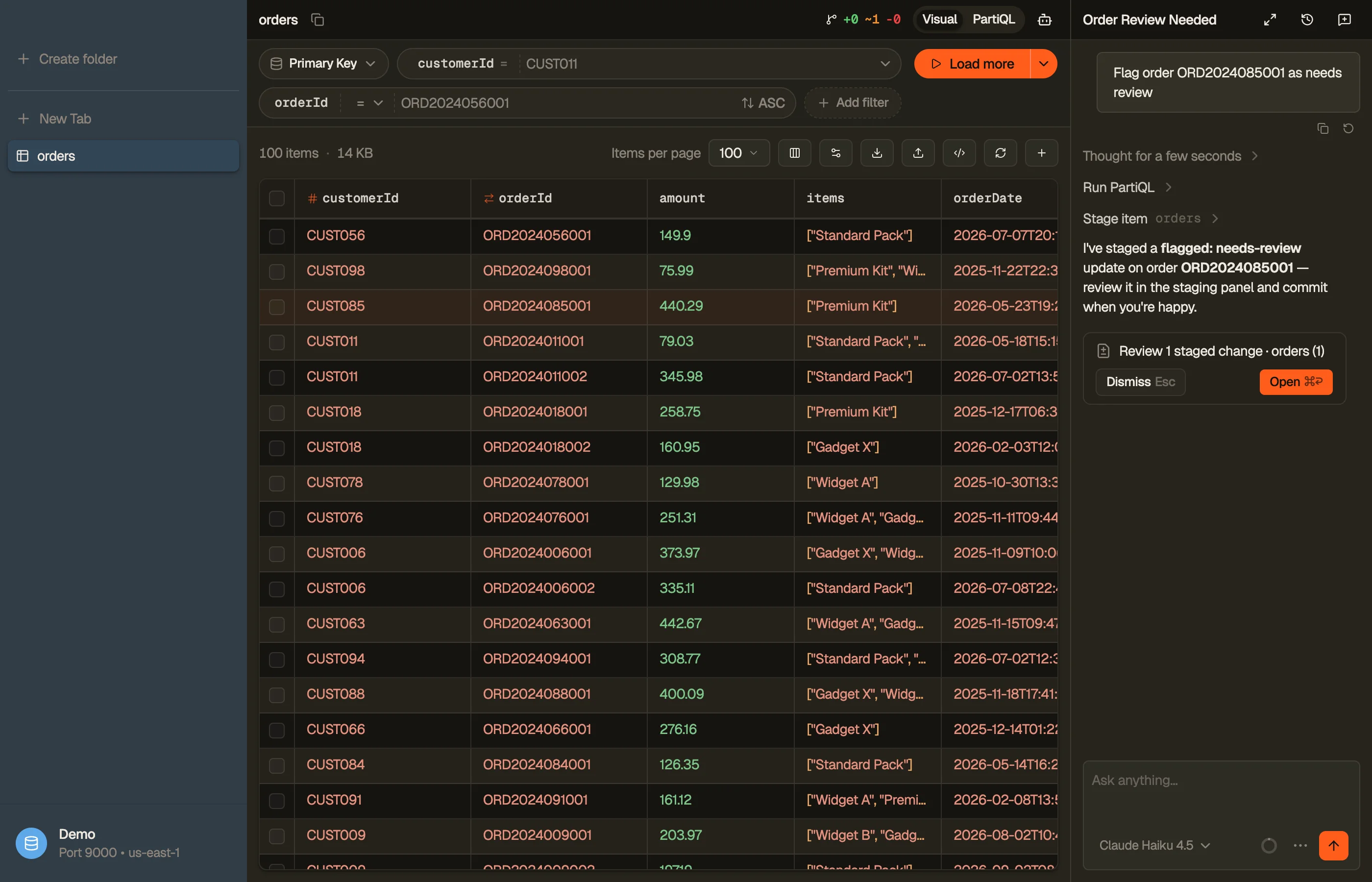 A staged-change review chip: the agent staged DynamoDB changes in this turn; clicking it opens them in DynoTable's Pending changes panel to review and commit.