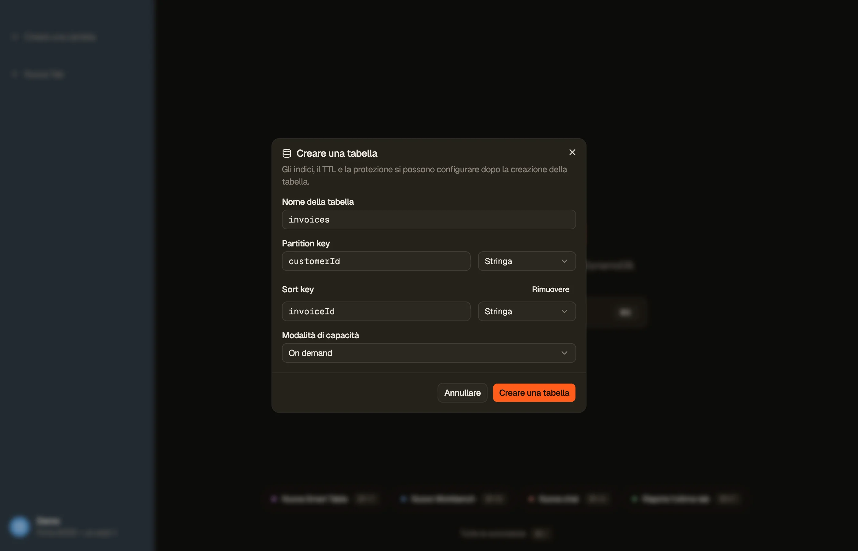 La finestra di dialogo Create table di DynoTable: il nome della tabella, una chiave di partizione e una chiave di ordinamento con i loro tipi di attributo e la scelta tra capacità on-demand e con provisioning.