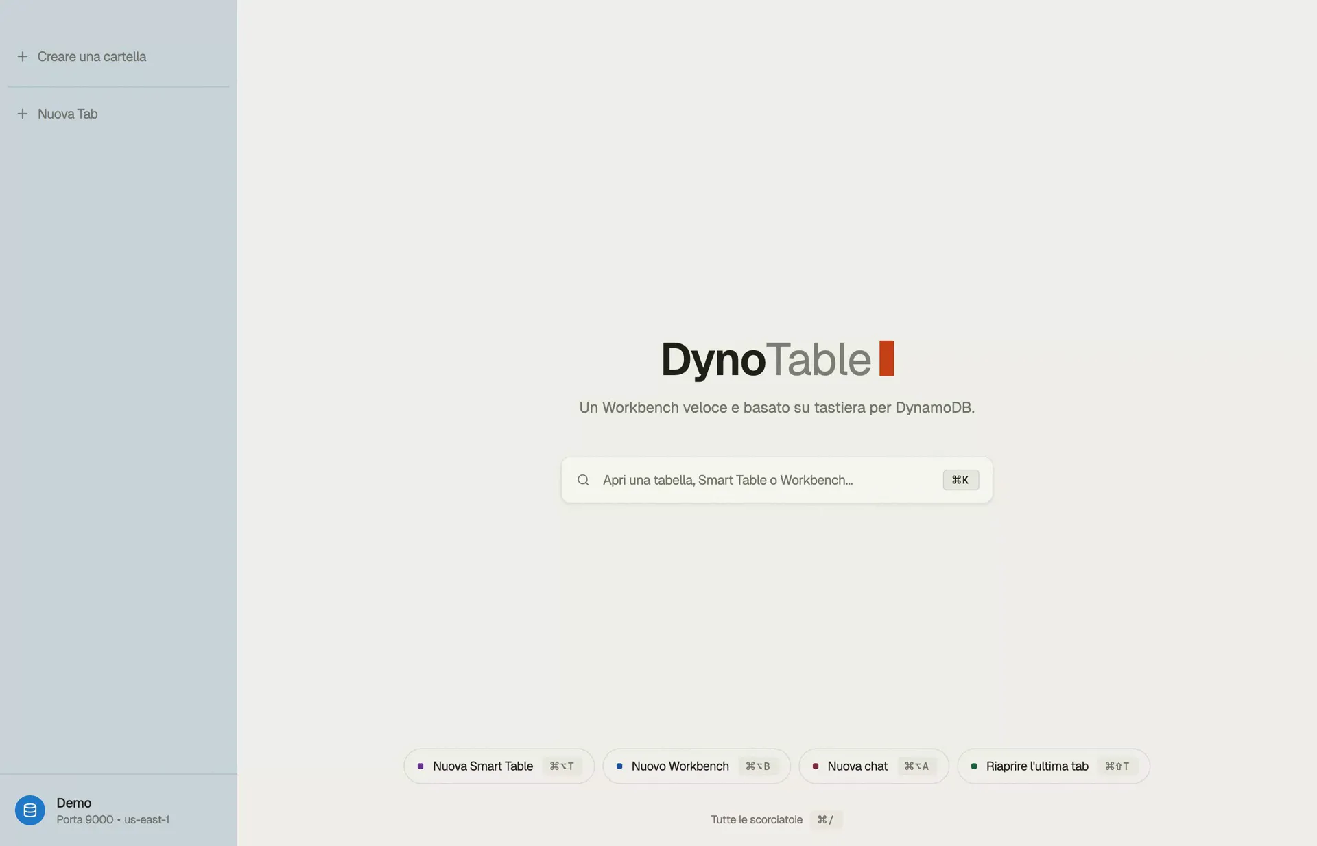 La GUI DynamoDB di DynoTable nella schermata iniziale: una barra ⌘K per aprire una tabella, una Smart Table o un workbench, con il profilo attivo e la regione fissati nella barra laterale.