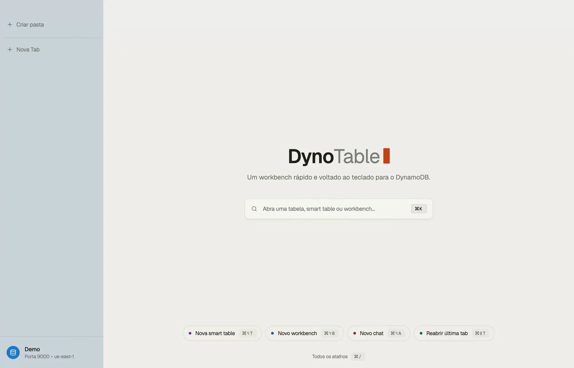 A interface DynamoDB do DynoTable na tela inicial: uma barra ⌘K para abrir uma tabela, Smart Table ou workbench, com o perfil ativo e a região fixados na barra lateral.